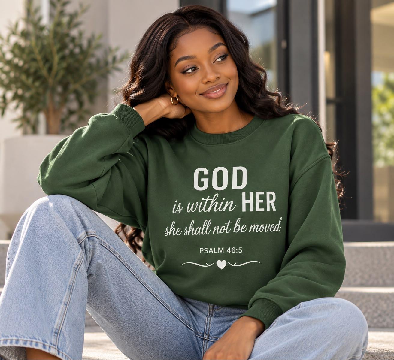 Woman wearing the olive God Is Within Her crewneck